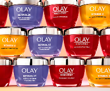  Assorted Olay skincare jars including Retinol24, Micro-Sculpting Cream, and Vitamin C featured in subscription savings offer